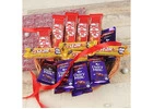 Holi Gift Combos with Sweets and Flowers Online