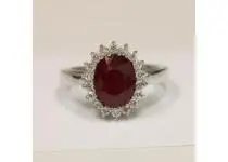 Cushion Ruby Prong Set Halo Ring With Round Diamonds